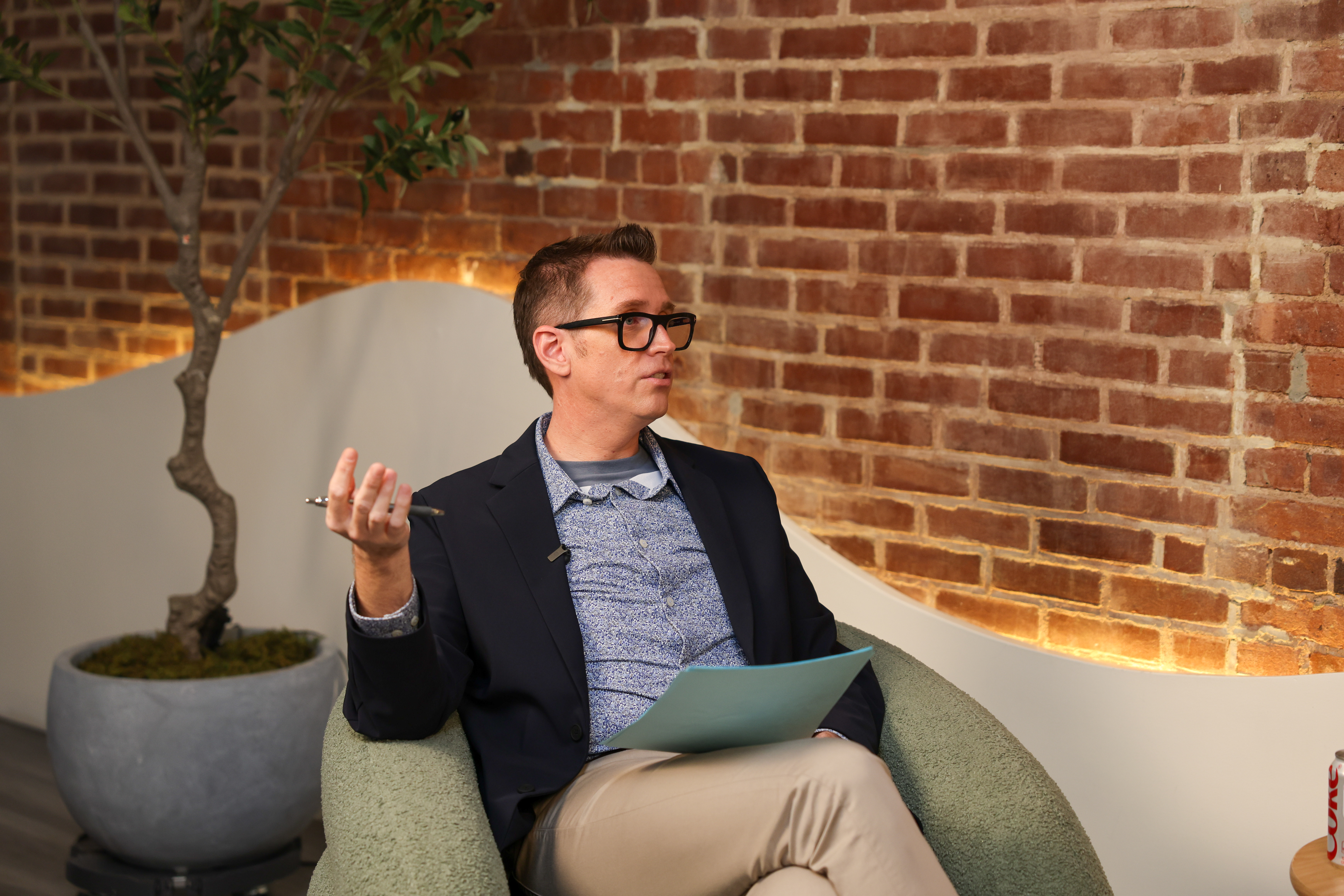 Bryan on the brick-wall set